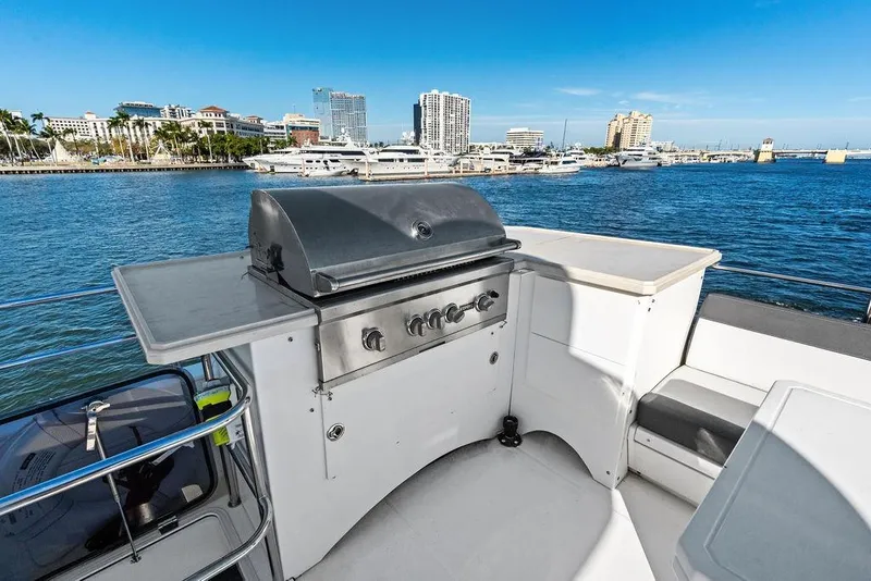 Slide: The Image of Outdoor grill on 2018 Galeon 640 Fly yacht with marina view. - 30