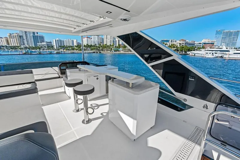 Slide: The Image of Luxurious 2018 Galeon 640 Fly yacht interior with modern seating and ocean view. - 31