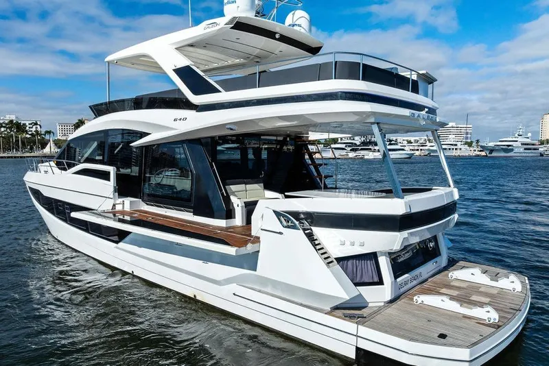 Slide: The Image of 2018 Galeon 640 Fly yacht on water, showcasing sleek design and modern features. - 4