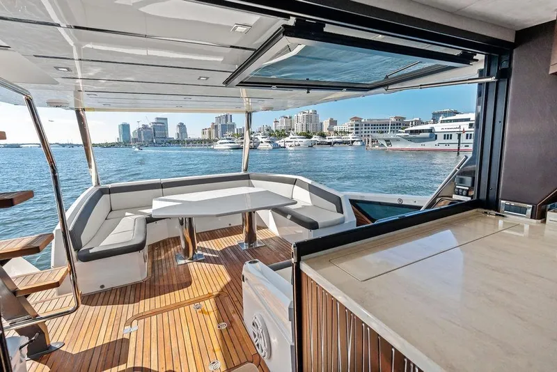 Slide: The Image of Luxurious 2018 Galeon 640 Fly yacht interior with waterfront city view. - 40