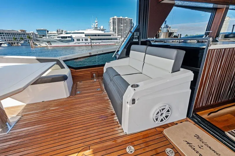 Slide: The Image of Luxurious 2018 Galeon 640 Fly yacht deck with seating and waterfront view. - 44