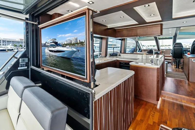 Slide: The Image of Luxurious interior of 2018 Galeon 640 Fly yacht with modern kitchen and seating area. - 48