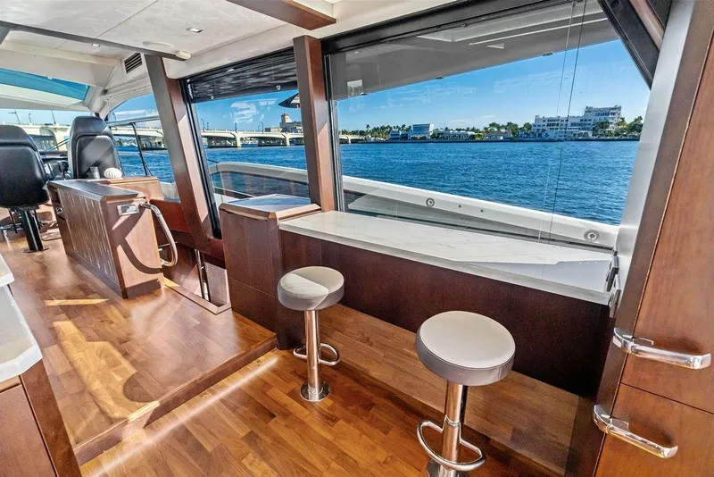 Slide: The Image of Luxurious interior of 2018 Galeon 640 Fly yacht with waterfront view. - 52
