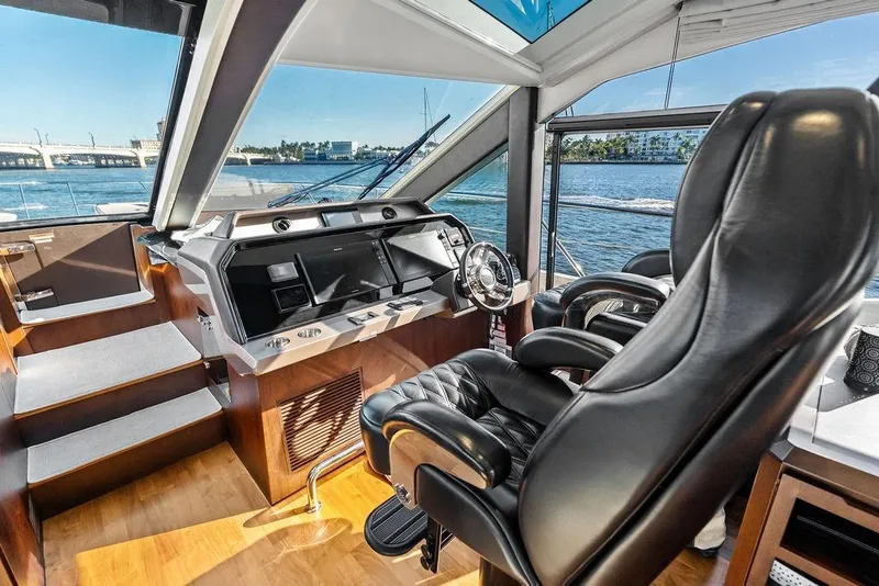 Slide: The Image of Luxurious interior of 2018 Galeon 640 Fly yacht with leather seating and modern helm. - 63