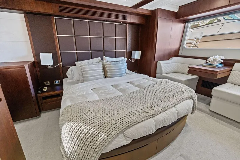 Slide: The Image of Luxurious bedroom interior of 2018 Galeon 640 Fly yacht with elegant wood finishes. - 67