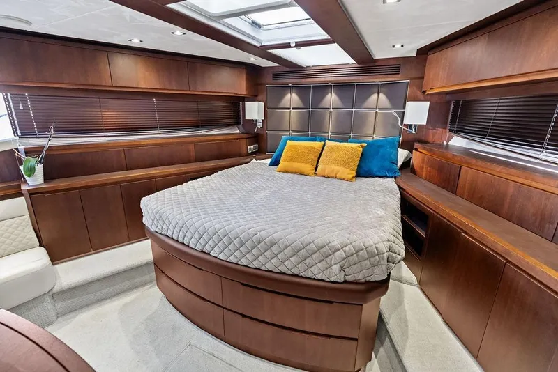 Slide: The Image of Luxurious bedroom interior of 2018 Galeon 640 Fly yacht with elegant wood finishes. - 76