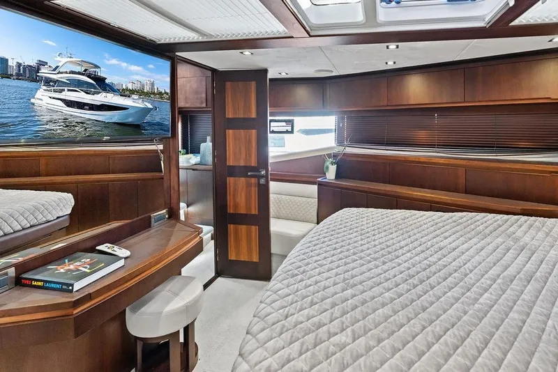 Slide: The Image of Luxurious interior of 2018 Galeon 640 Fly yacht with elegant wood finishes and modern amenities. - 78