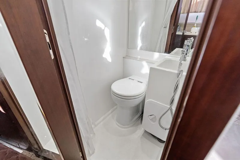 Slide: The Image of Bathroom interior of 2018 Galeon 640 Fly yacht, featuring modern fixtures and sleek design. - 79