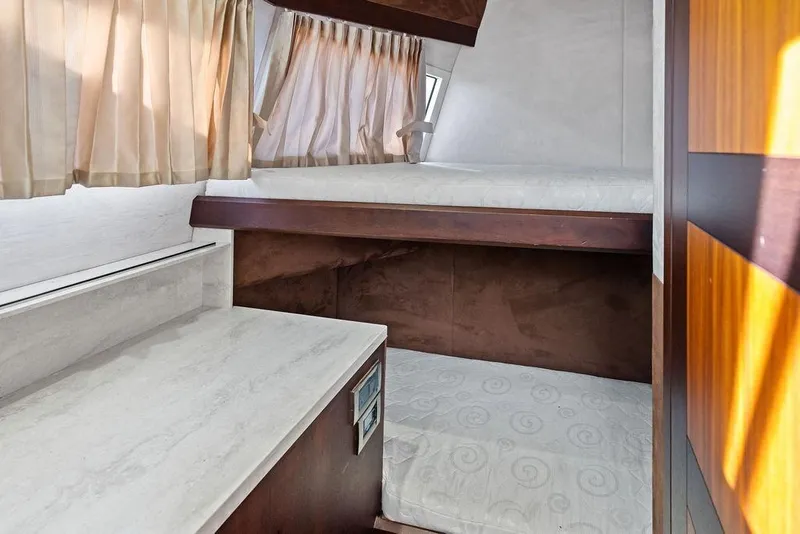 Slide: The Image of Interior cabin of 2018 Galeon 640 Fly yacht with bunk beds and curtains. - 85