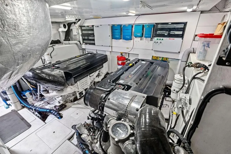 Slide: The Image of Engine room of 2018 Galeon 640 Fly yacht with dual engines and control panels. - 88