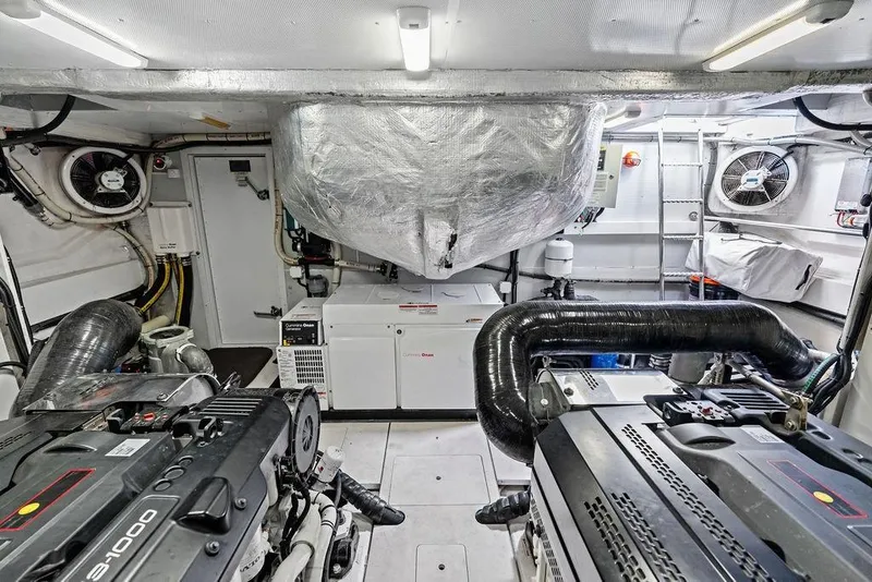 Slide: The Image of Engine room of 2018 Galeon 640 Fly yacht, featuring advanced machinery and equipment. - 90