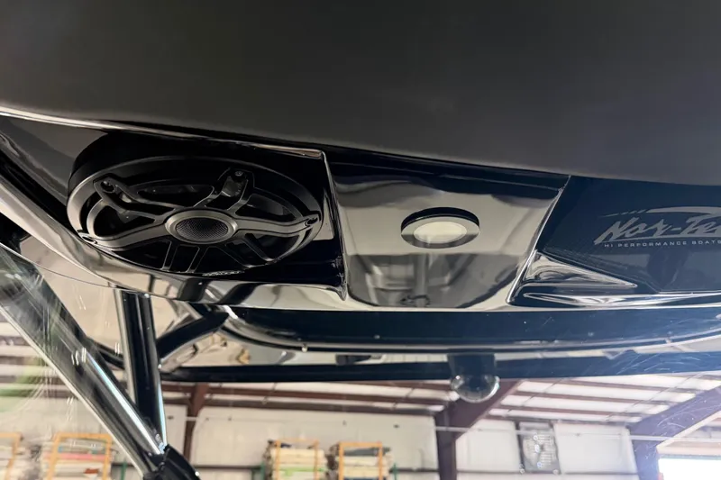 Slide: The Image of 2025 Nor-Tech 390 Sport Center Console speaker and light detail in a sleek, modern design. - 14