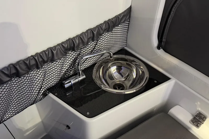 Slide: The Image of Stainless steel sink on 2025 Nor-Tech 390 Sport Center Console boat. - 39