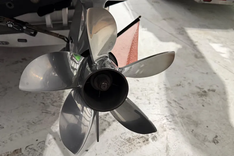 Slide: The Image of Close-up of a 2025 Nor-Tech 390 Sport Center Console boat propeller. - 47