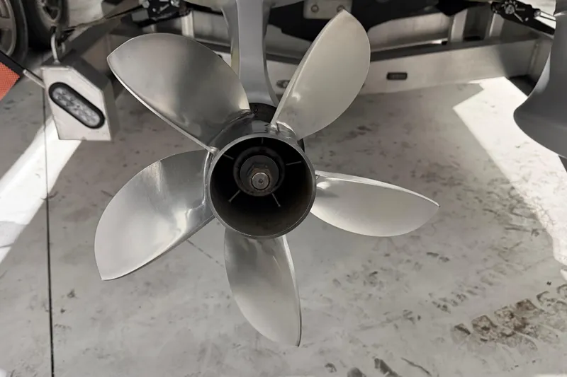 Slide: The Image of Propeller of 2025 Nor-Tech 390 Sport Center Console boat, close-up view. - 49