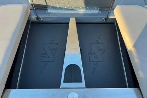 Slide: The Image of 2026 Supreme S220 boat interior with sleek design and logo detailing. - 18
