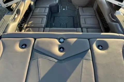 Slide: The Image of 2026 Supreme S220 boat interior with luxurious seating and modern design. - 9