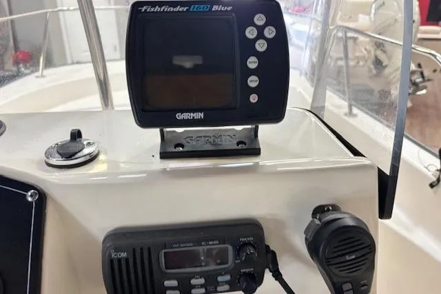 Slide: The Image of Console of 2003 Boston Whaler 170 Montauk with Garmin Fishfinder and Icom radio. - 6