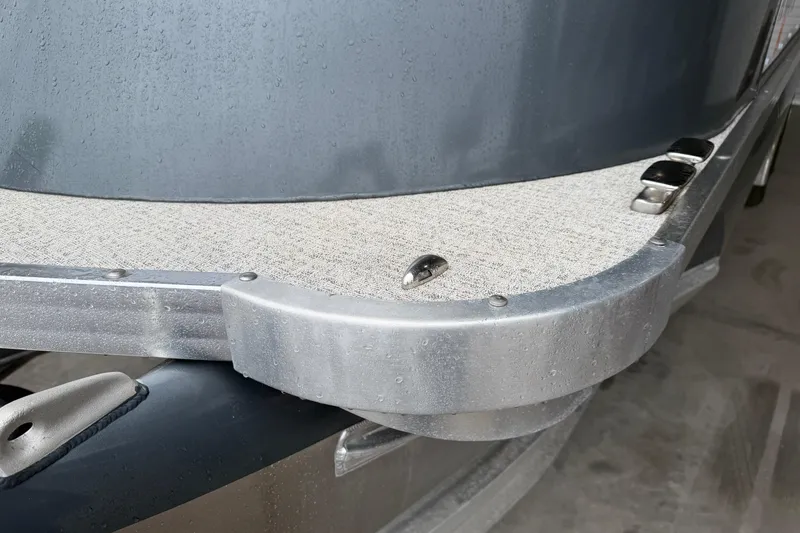 Slide: The Image of Close-up of 2023 Aloha Pontoon PS 260 TT deck with metal fittings. - 19