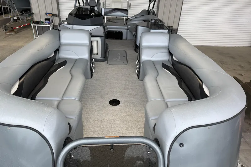 Slide: The Image of 2023 Aloha Pontoon PS 260 TT interior with spacious seating and modern design. - 26