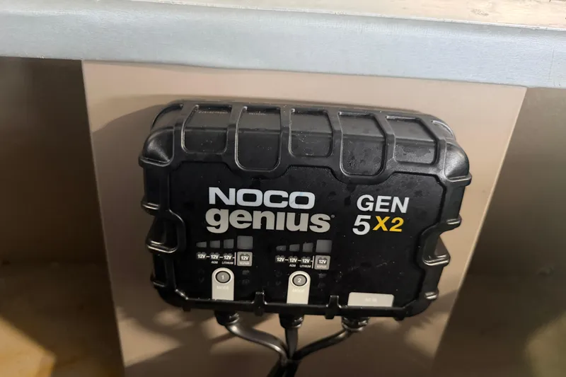 Slide: The Image of NOCO Genius GEN 5X2 battery charger installed on 2023 Aloha Pontoon PS 260 TT. - 40