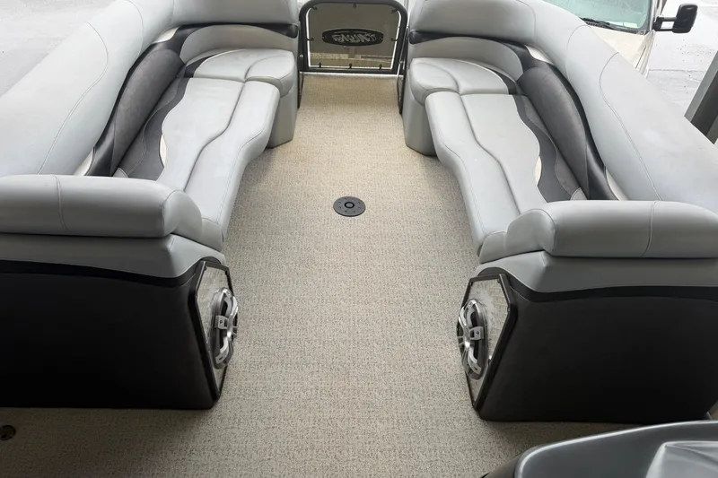 Slide: The Image of 2023 Aloha Pontoon PS 260 TT interior with plush seating and modern design. - 52