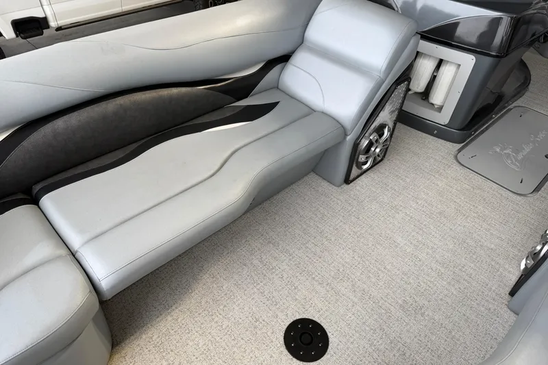 Slide: The Image of 2023 Aloha Pontoon PS 260 TT interior with sleek gray seating and modern design. - 56