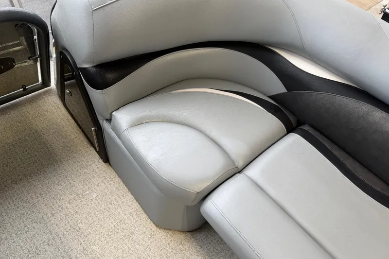 Slide: The Image of 2023 Aloha Pontoon PS 260 TT interior seating with sleek, modern design and comfortable upholstery. - 68