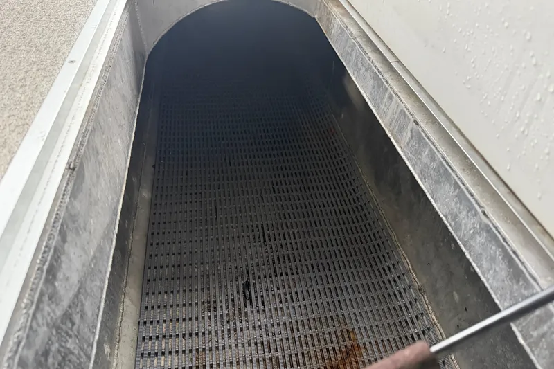 Slide: The Image of Interior view of 2023 Aloha Pontoon PS 260 TT, featuring a metal grate surface. - 73