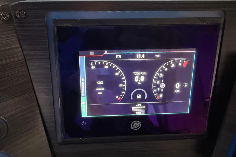 Slide: The Image of Dashboard display of 2023 Aloha Pontoon PS 260 TT showing speed, fuel, and RPM gauges. - 76