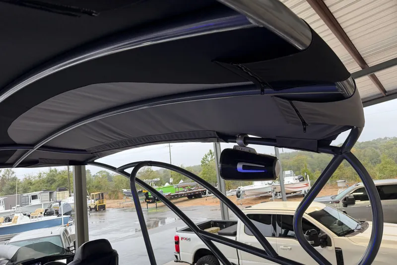 Slide: The Image of 2023 Aloha Pontoon PS 260 TT with sleek canopy and modern design features. - 89