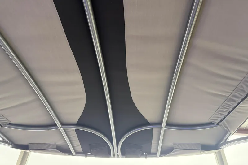 Slide: The Image of 2023 Aloha Pontoon PS 260 TT canopy with sleek metal frame design. - 94