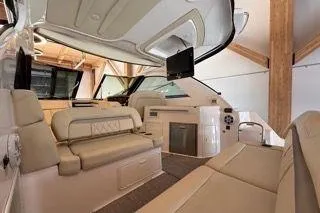 Slide: The Image of 2019 Regal 35 Sport Coupe interior with luxurious seating and modern amenities. - 9