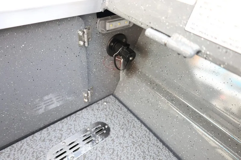 Slide: The Image of Interior view of 2026 Thunder Jet 209 Rush OT boat, featuring a speckled gray finish. - 17