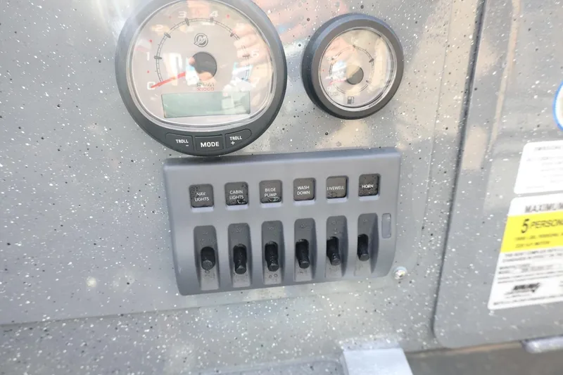 Slide: The Image of Dashboard of 2026 Thunder Jet 209 Rush OT with gauges and control switches. - 18