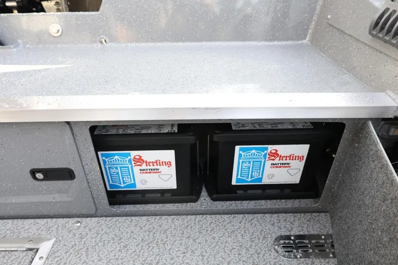 Slide: The Image of 2026 Thunder Jet 209 Rush OT boat battery compartment with Sterling Battery Company units. - 20