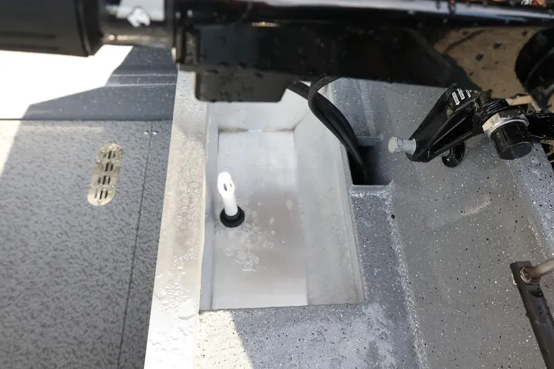 Slide: The Image of 2026 Thunder Jet 209 Rush OT boat interior detail with water drainage system. - 25