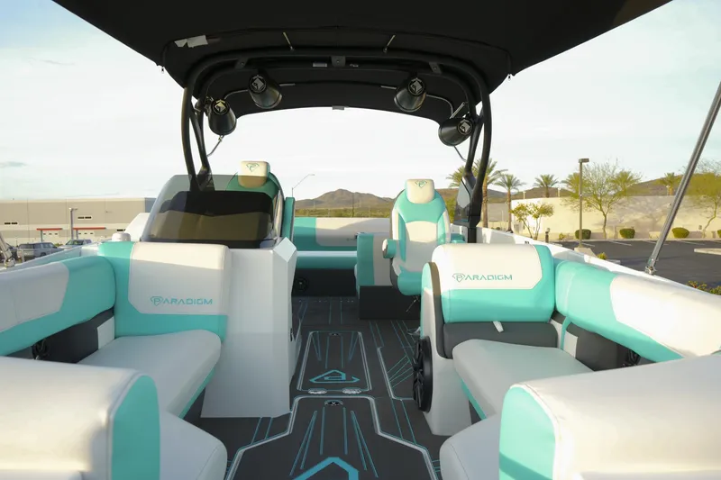 Slide: The Image of 2026 Paradigm 266 SL SURF boat interior with modern seating and sleek design. - 6