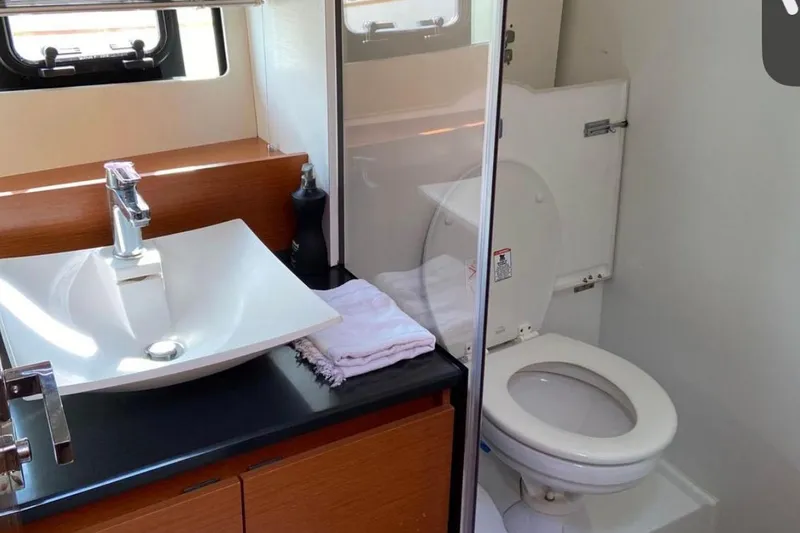 Slide: The Image of Modern bathroom in 2016 Prestige 450S yacht with sink and toilet. - 23