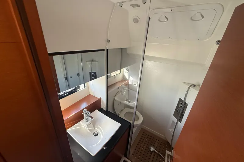 Slide: The Image of Luxurious bathroom in 2016 Prestige 450S yacht with modern sink and shower. - 26