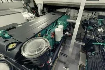 Slide: The Image of Engine room of a 2016 Prestige 450S yacht, showcasing mechanical components. - 29