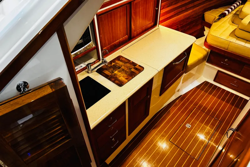 Slide: The Image of Luxurious interior of 2015 MJM 36z Express yacht with elegant wood finishes and modern amenities. - 11