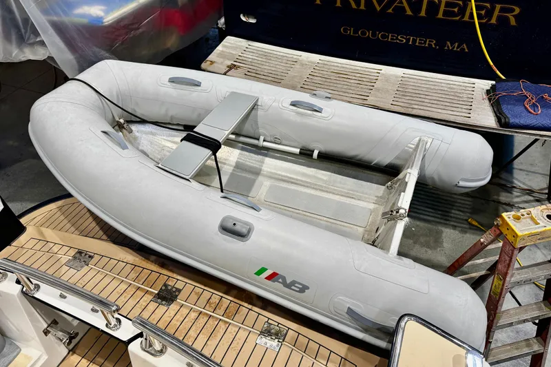Slide: The Image of Inflatable dinghy on MJM 36z Express yacht, 2015 model, docked in Gloucester, MA. - 44