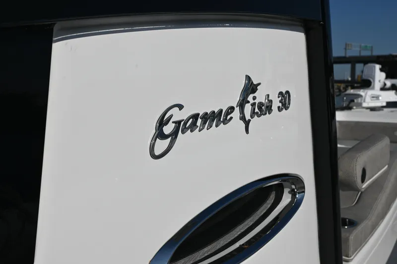 Slide: The Image of 2025 Sea Hunt Gamefish 30 Coffin Box boat logo detail. - 17