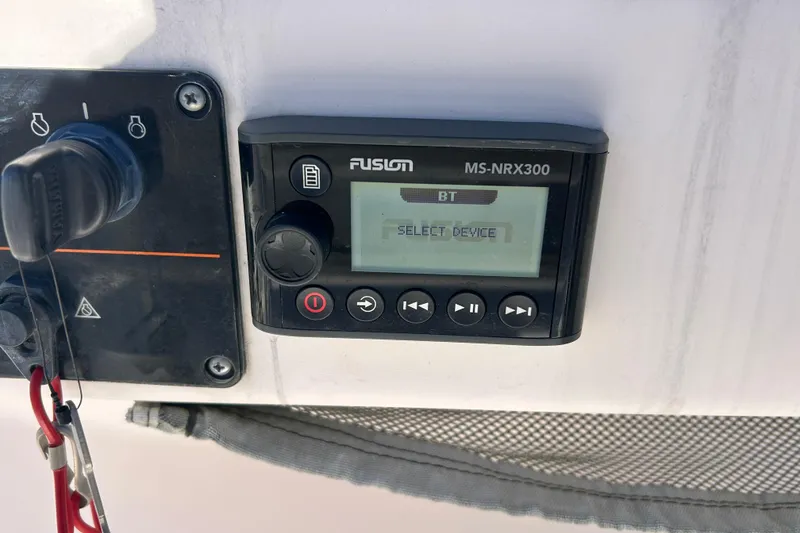 Slide: The Image of Fusion MS-NRX300 stereo system on 2003 Grady-White Chase 273 boat dashboard. - 21