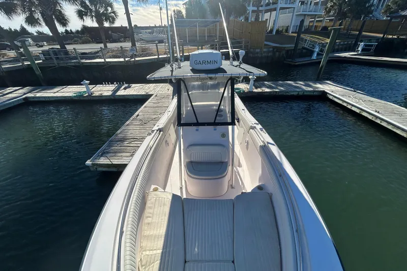 Slide: The Image of 2003 Grady-White Chase 273 boat docked at marina with Garmin equipment. - 29