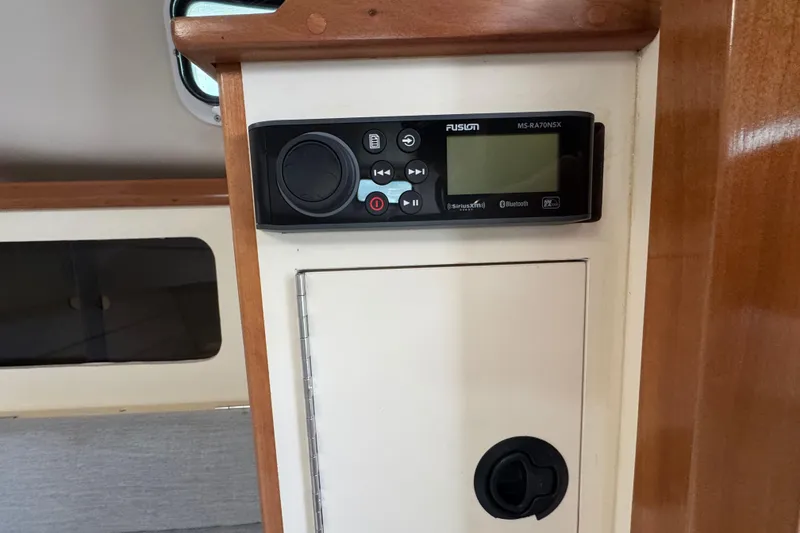 Slide: The Image of Fusion stereo system on 2001 Albin 28 Tournament Express boat interior. - 14