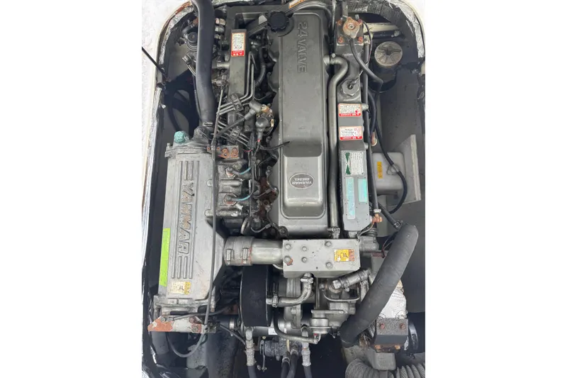 Slide: The Image of Engine of a 2001 Albin 28 Tournament Express, featuring a Yanmar diesel engine. - 20