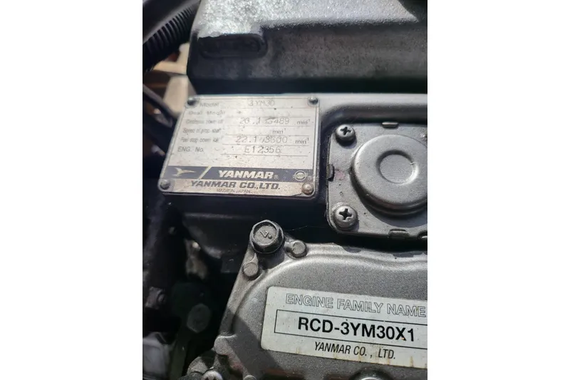 Slide: The Image of Close-up of a Yanmar engine label on a 2009 Ranger Tugs R-21 EC. - 11