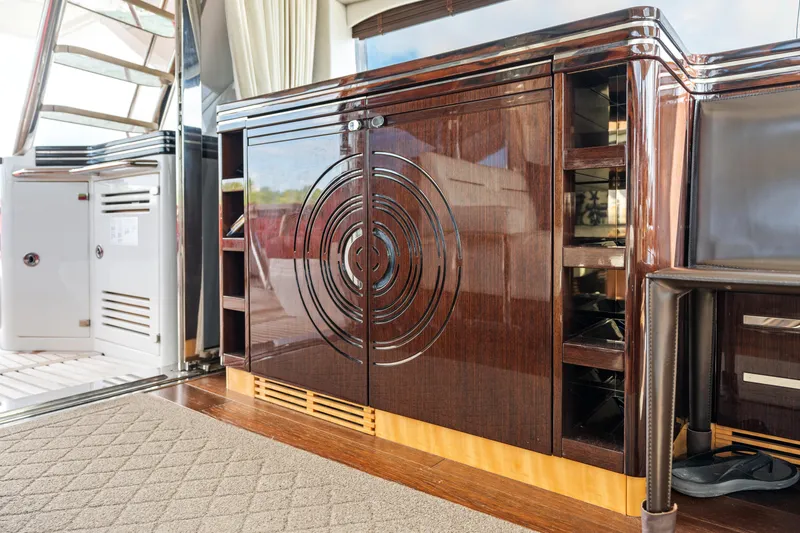 Slide: The Image of Luxurious interior of 2014 Sunseeker 68 Sport Yacht with modern furnishings and large TV. - 14